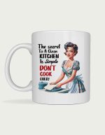 Retro housewife mug - vintage pinup housewife washing dishes with the text The Secret To A Clean Kitchen Is Simple, Don't Cook Ever