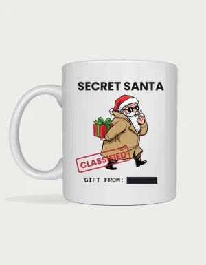 Secret Santa Mug - spy Santa in a trench coat and sunglasses with a CLASSIFIED stamp and redacted gift from line on a white ceramic mug