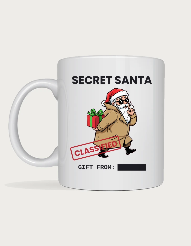 Secret Santa Mug - spy Santa in a trench coat and sunglasses with a CLASSIFIED stamp and redacted gift from line on a white ceramic mug