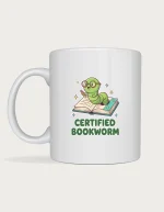 Bookworm mug with a cute green worm wearing round glasses popping out of an open book above Certified Bookworm lettering, on a white ceramic mug
