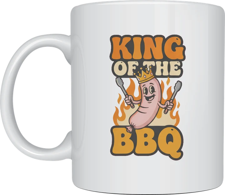 Dad mug - crowned cartoon sausage holding tongs with King of the BBQ lettering printed on a white ceramic mug