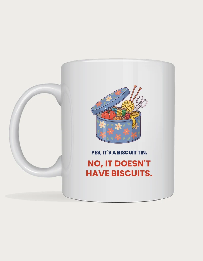 Nan Mug - floral biscuit tin full of sewing supplies with the words yes it's a biscuit tin no it doesn't have biscuits, printed on a white ceramic mug