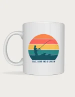 Beach fishing mug with a retro striped sunset and a surf angler silhouette casting into waves on a white ceramic mug