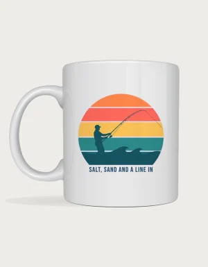 Beach fishing mug with a retro striped sunset and a surf angler silhouette casting into waves on a white ceramic mug