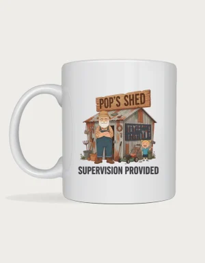 Gifts for pop - pop in overalls outside a tin shed with tools and a grandkid helper, Pop's Shed Supervision Provided, on a white mug