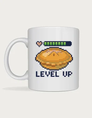 Meat pie mug: 8-bit pixel art meat pie with tomato sauce, a full health bar and heart above, and the words Level Up