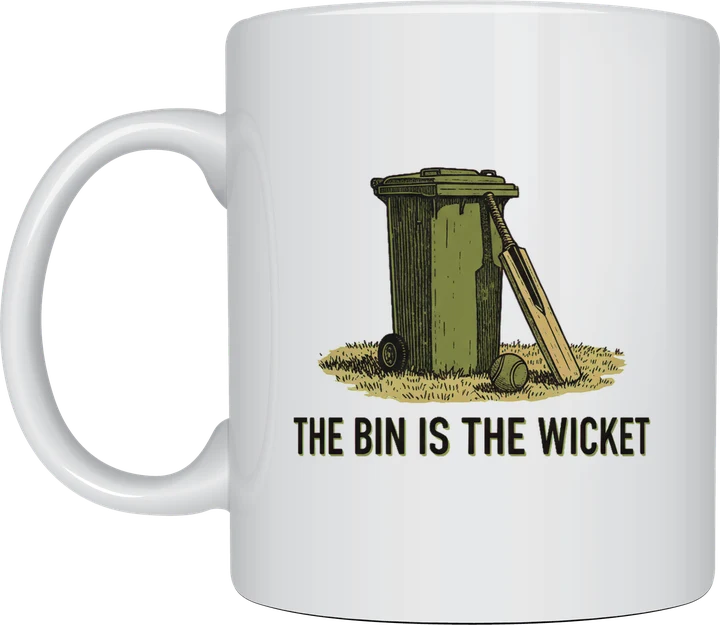 Backyard cricket mug: Linocut illustration of a wheelie bin used as cricket stumps on a dry lawn, with a bat and tennis ball, above the words The Bin Is the Wicket
