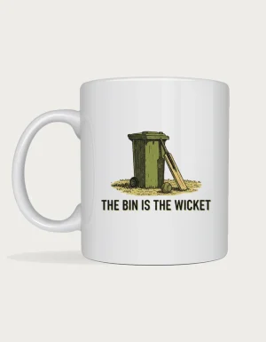 Backyard cricket mug: Linocut illustration of a wheelie bin used as cricket stumps on a dry lawn, with a bat and tennis ball, above the words The Bin Is the Wicket