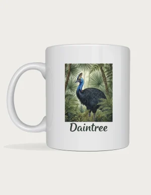 Daintree mug: Watercolour southern cassowary standing in lush tropical rainforest with ferns and fan palms, above the word Daintree