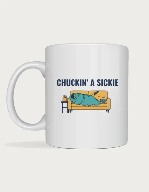 Chuckin' a sickie mug: Risograph-style person wrapped in a teal doona like a burrito on a yellow couch holding a TV remote, under the words Chuckin' a Sickie