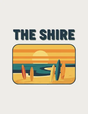 Retro postcard with the words The Shire above a surf beach at sunset with surfboards standing in the sand - flat print artwork for the the shire mug