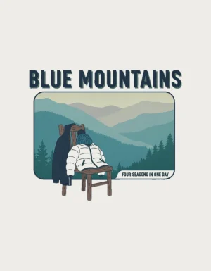 Retro postcard with the words Blue Mountains above misty ridges and a chair piled with jackets, reading Four Seasons in One Day - flat print artwork for the blue mountains mug