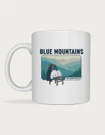 Blue mountains mug: Retro postcard with the words Blue Mountains above misty ridges and a chair piled with jackets, reading Four Seasons in One Day