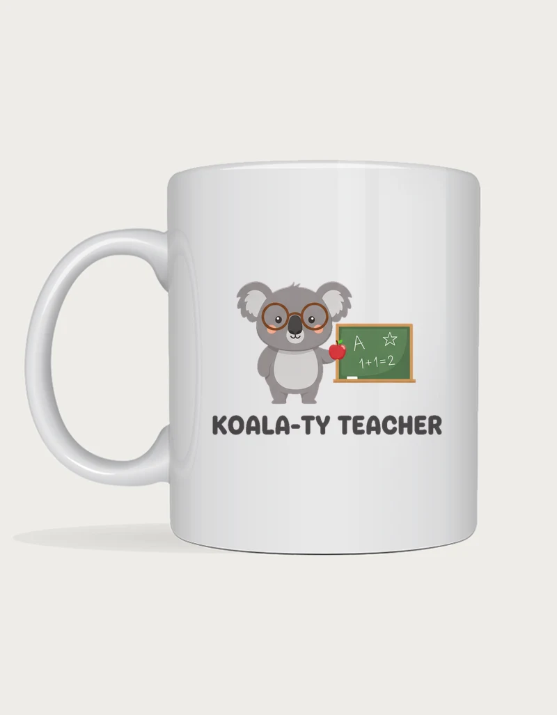 Koala teacher mug with a cute koala in round glasses holding an apple beside a chalkboard and the words Koala-ty Teacher, on a white ceramic mug