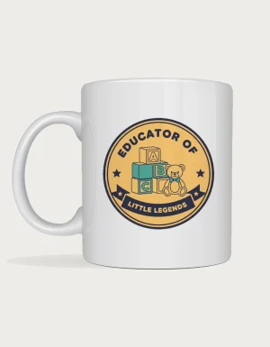 Childcare educator gift mug with a retro badge reading Educator of Little Legends, with toy alphabet blocks and a teddy bear, on a white ceramic mug
